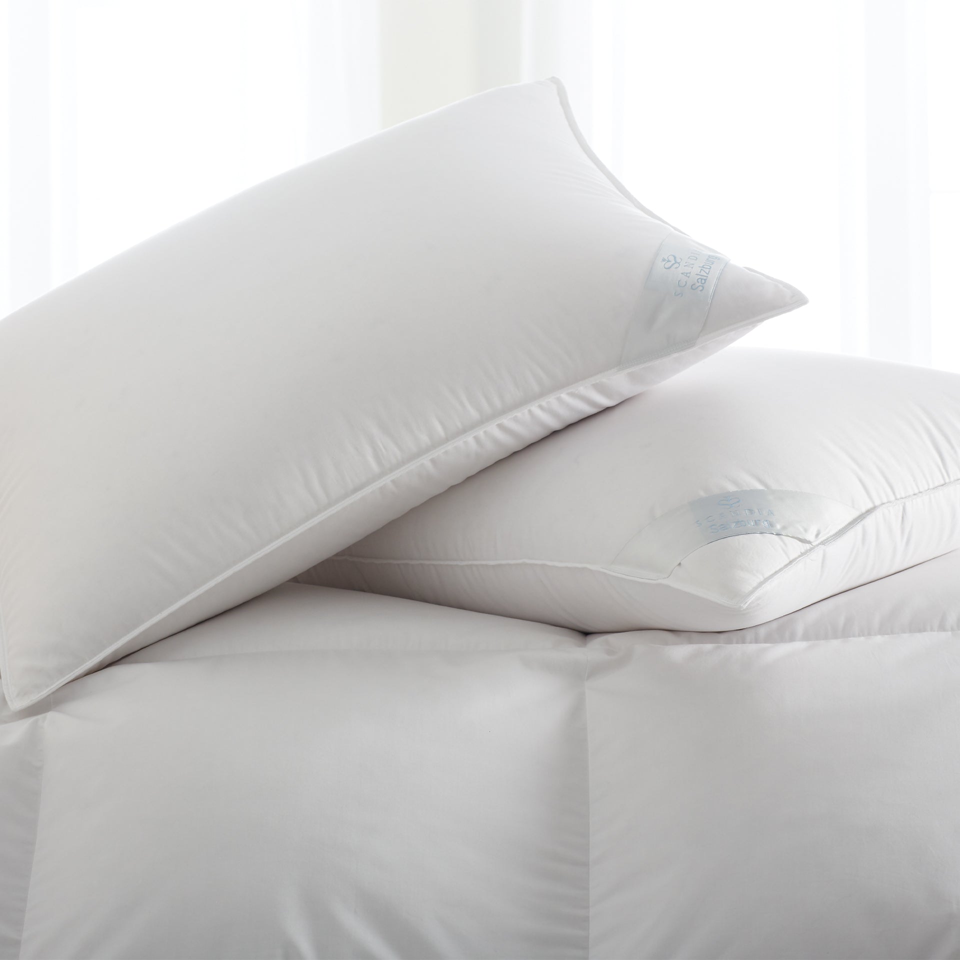 http://www.scandiahome.com/cdn/shop/products/salzburg-pillow-scandiahome-polishwhitedown-1-web.jpg?v=1669659689