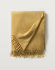 Carlotta throw in the color ochre, 